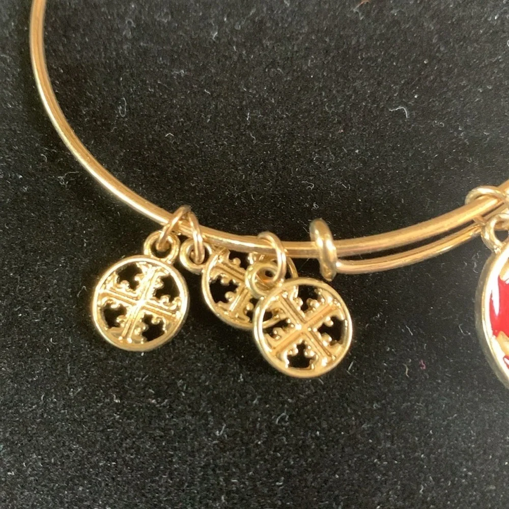 Tory Burch red/gold and white/gold with three gold charms bracelet